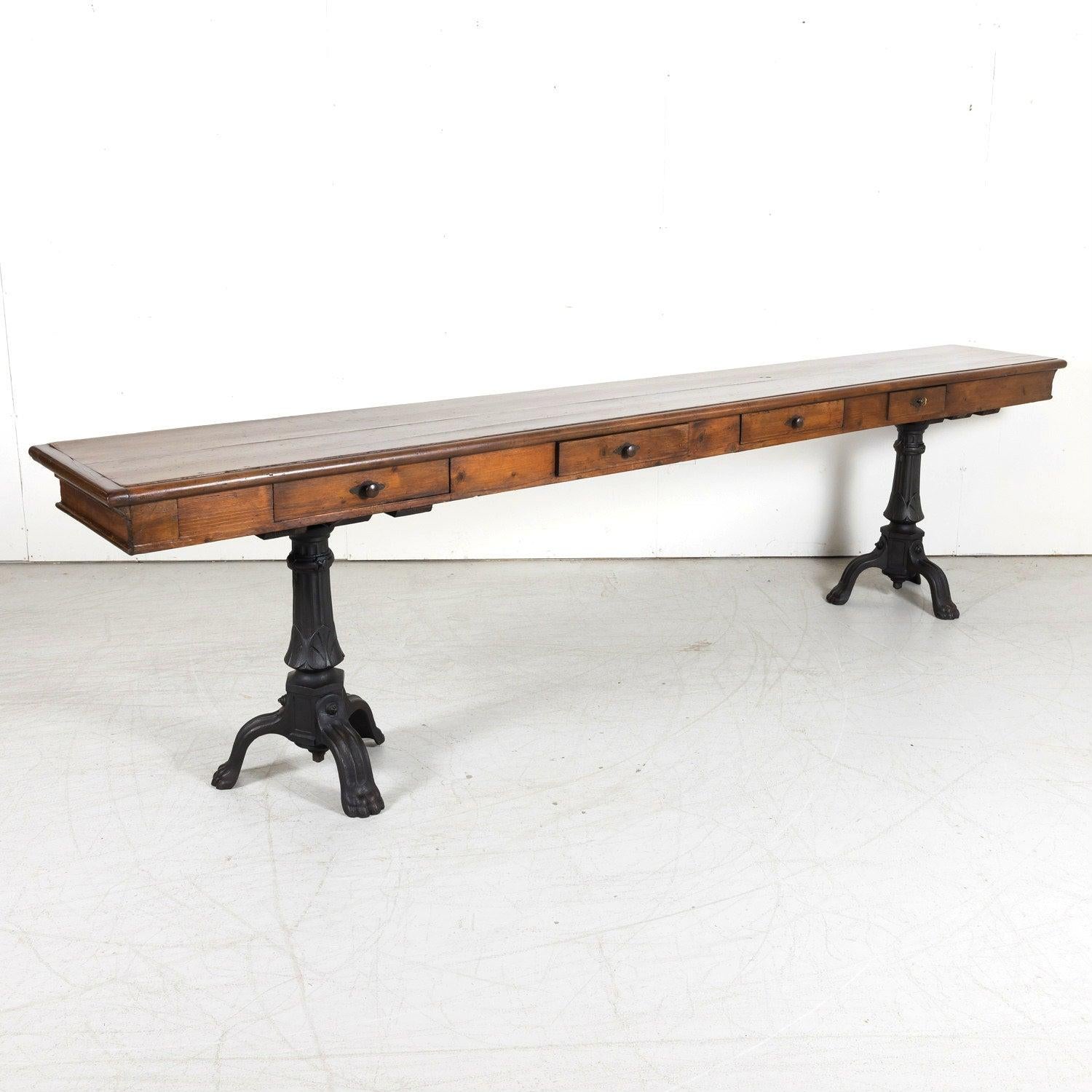 A handsome 19th century French Louis Philippe style console or sofa table, circa 1880s, handcrafted of walnut by talented artisans from the historic city of Perpignan. Known for its blend of Mediterranean and Catalan influences, Perpignan was a hub