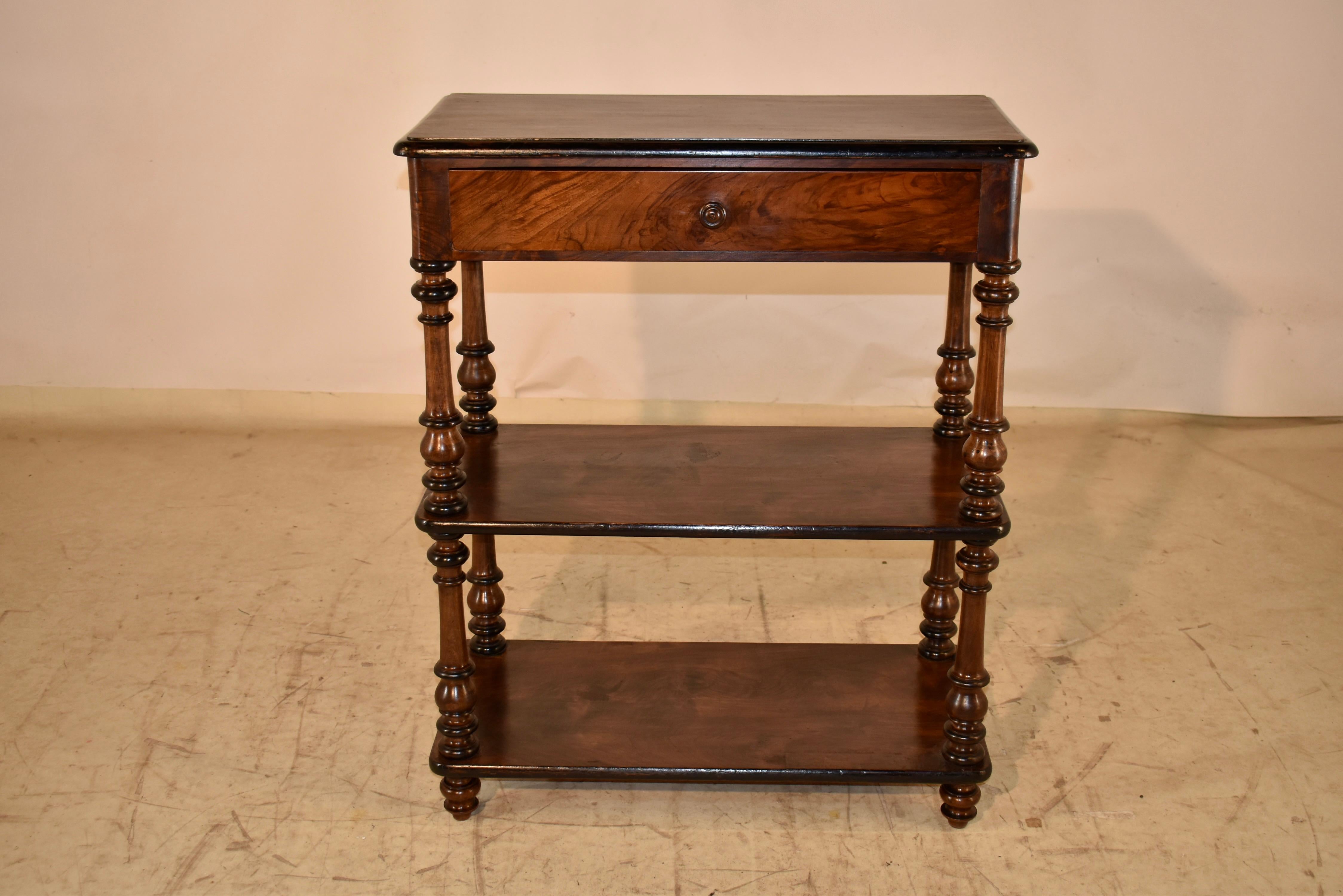 19th century walnut buffet from France in the ever-popular Louis-Philippe style.  The entire piece has wonderful graining, for a show-stopping look in any room or office!  The top has absolutely gorgeous graining, and has a beveled edge, which is