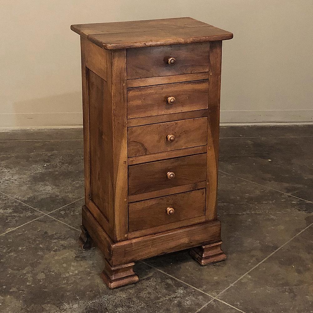 19th century French Louis Phlipped fruitwood Chiffoniere ~ Petite commode is a great example of the tailored lines of the genre. Rendered from solid old-growth fruitwood to reveal a lovely warm color and patina, it features five drawers all