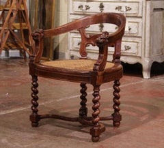 19th Century French Renaissance Oak Barrel Armchair with Lion Heads & Cane Seat