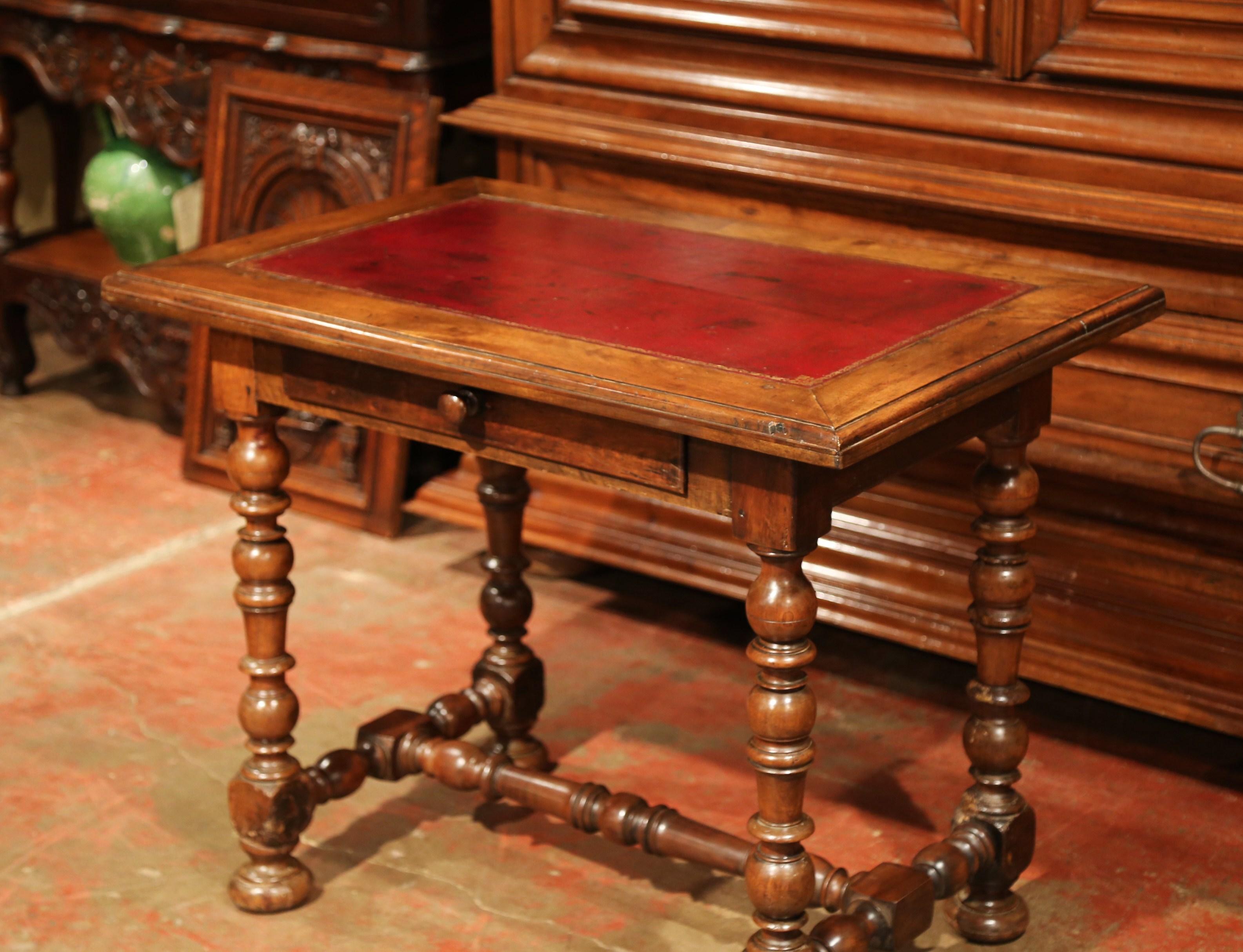 Incorporate extra, functional surface space into your living room with this elegant fruitwood end table. Crafted in the Perigord region of France, circa 1860, the side table features a single drawer across the front with original wooden knob. The