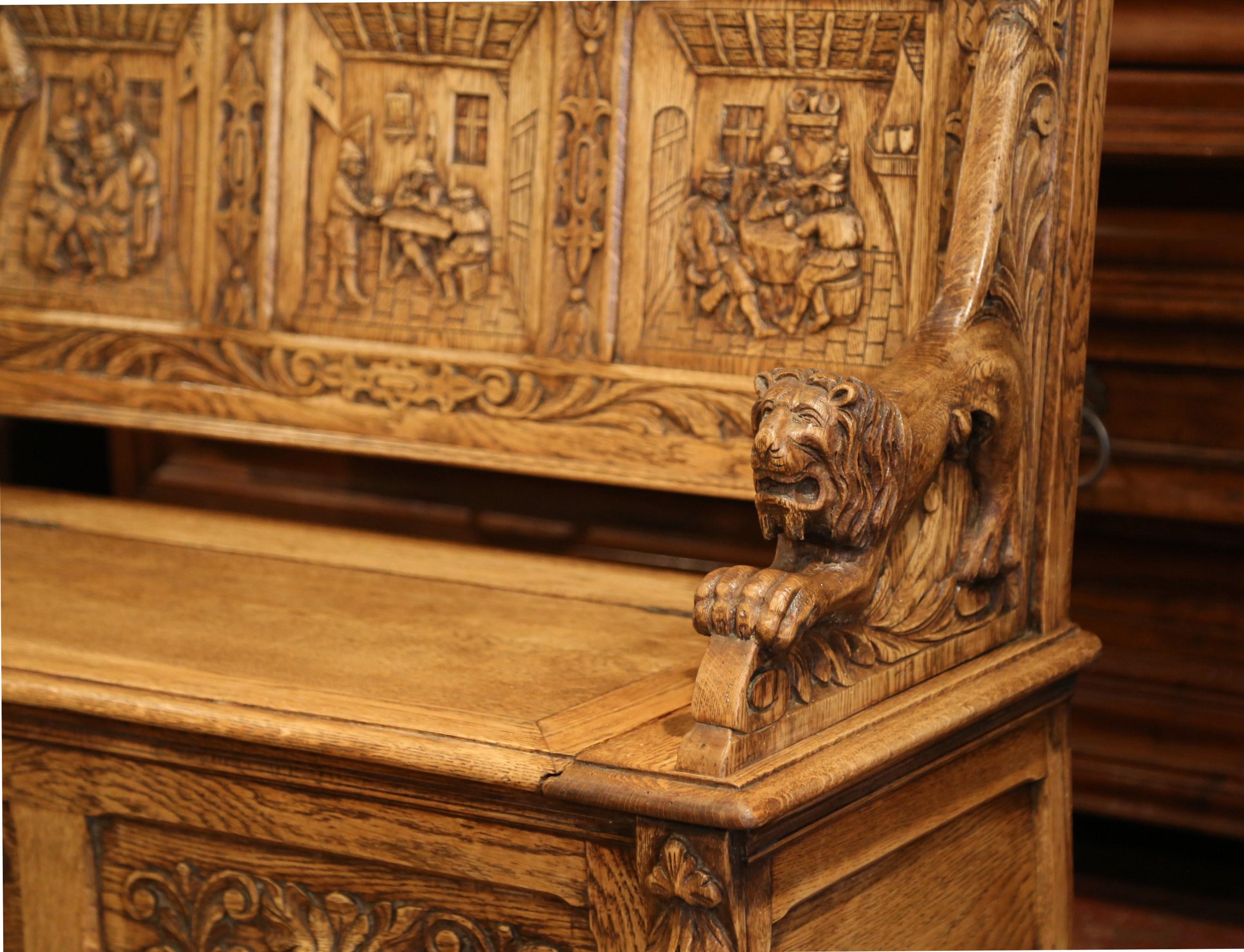 Compliment your entryway or mud room with this heavily carved Louis XIII bench. Crafted in France, circa 1870, and ideal to store extra blankets, kids toy or other objects, the antique bench features exquisite carvings which took years to chisel.