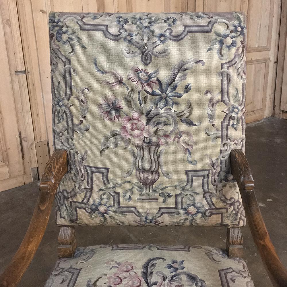 19th century French Louis XIII needlepoint armchair represents the essence of style, grace and elegance, all rendered by a master sculptor from old-growth white oak, then upholstered in hand knotted wool needlepoint tapestry, which all the experts