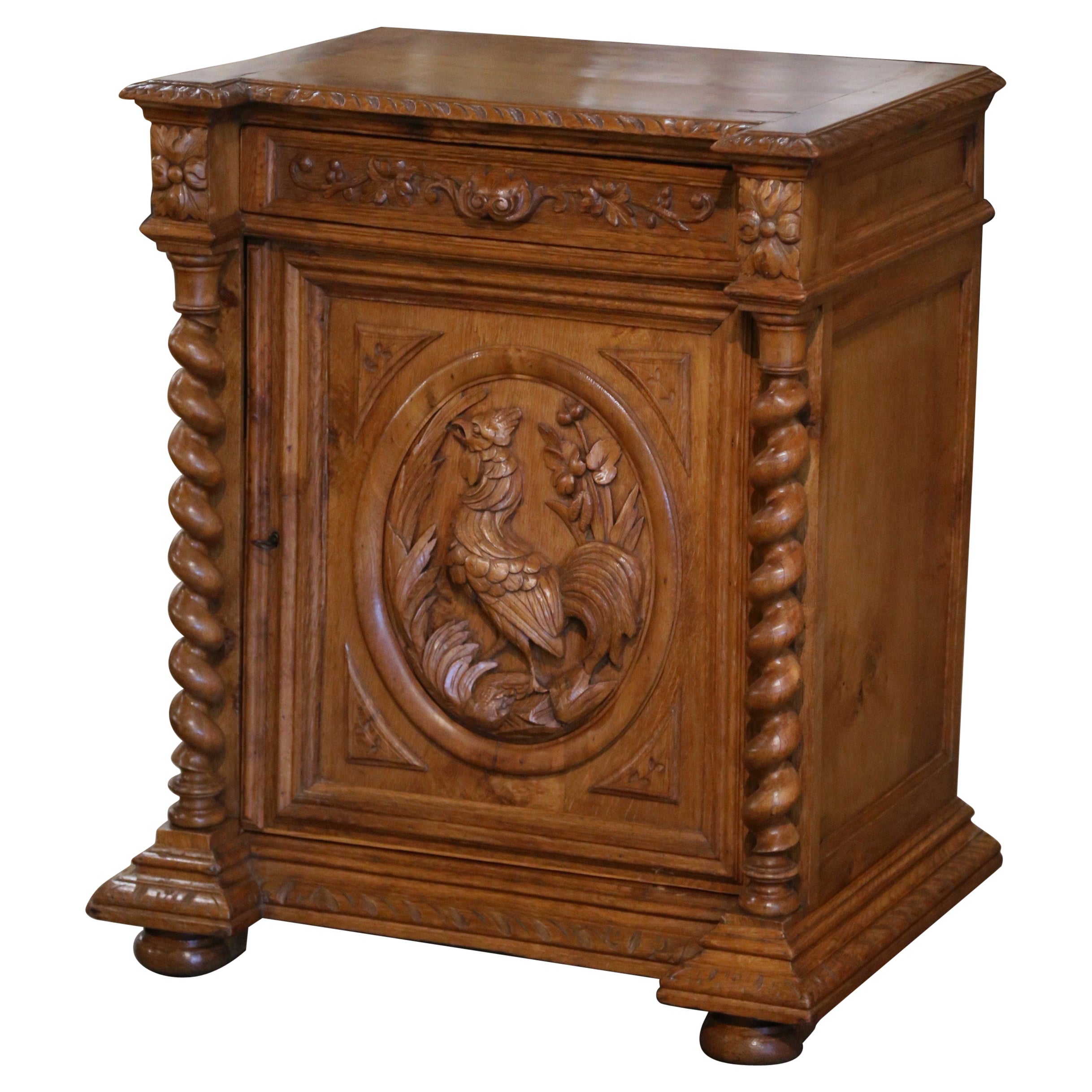 Armoire Louis XIII du 19ème siècle en chêne torsadé avec motif de coq
