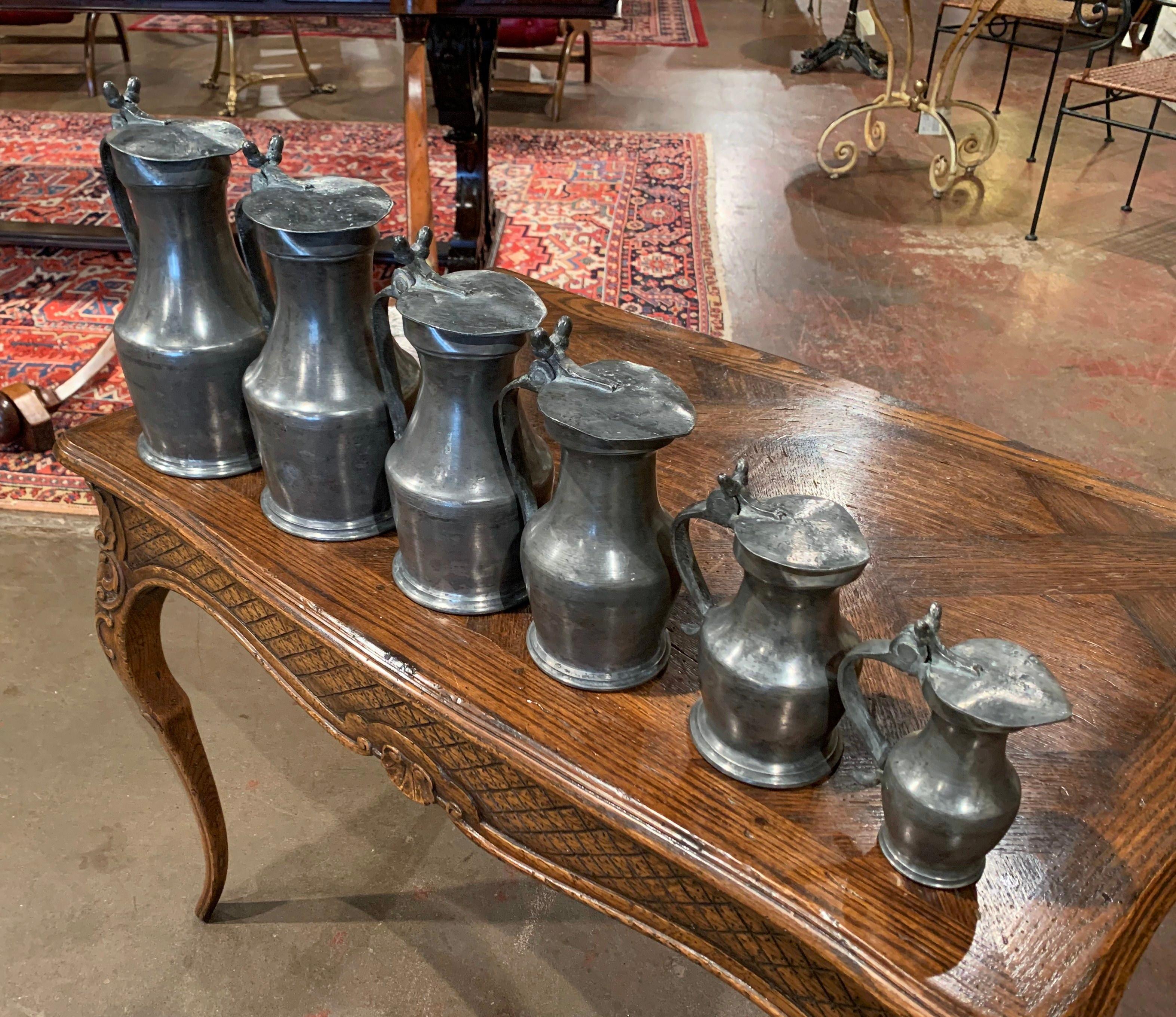 Patinated 19th Century French Louis XIII Pewter Pitchers in Graduated Sizes, Set of Six