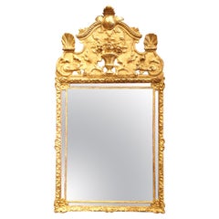 Specchio da parete Luigi XIV del XIX secolo in legno dorato intagliato
