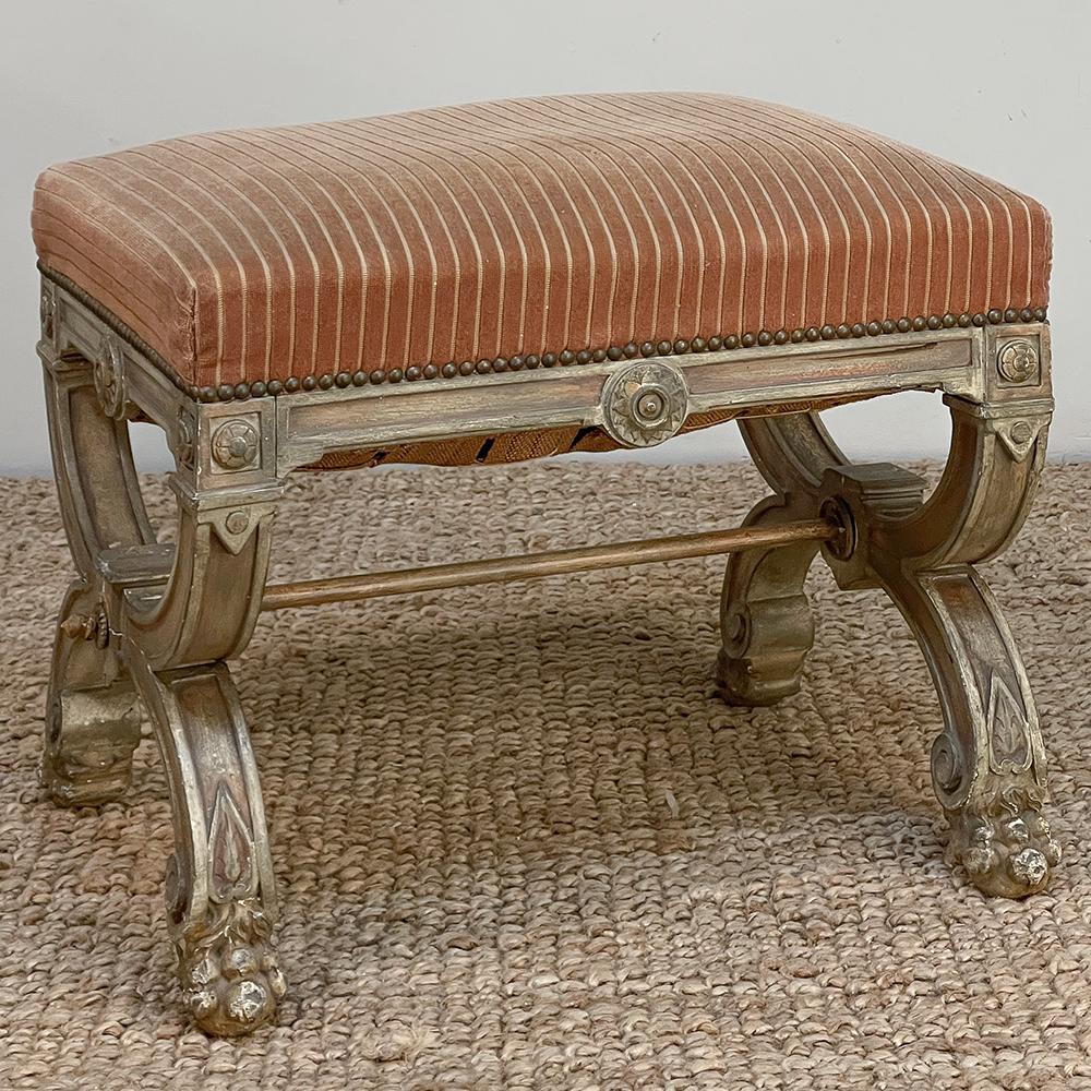 19th Century French Louis XIV Painted Stool features tailored architecture and masculine adornment, plus an original painted finish that makes it more compatible with today's casual lifestyles.  Upholstered seat is in serviceable condition but