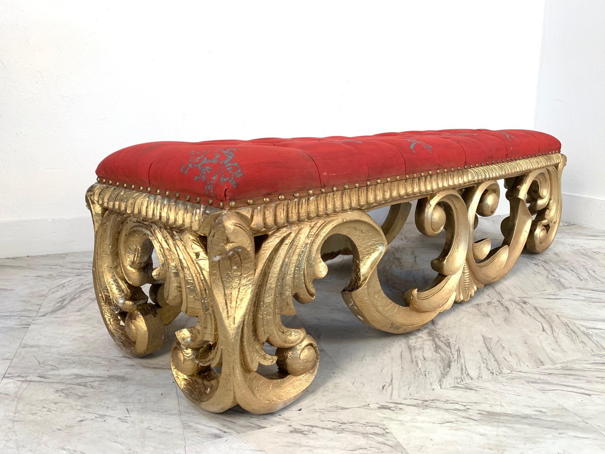 French Louis XIV style giltwood bench. The bench has really nice decorative fabric with a solid carved wood frame.