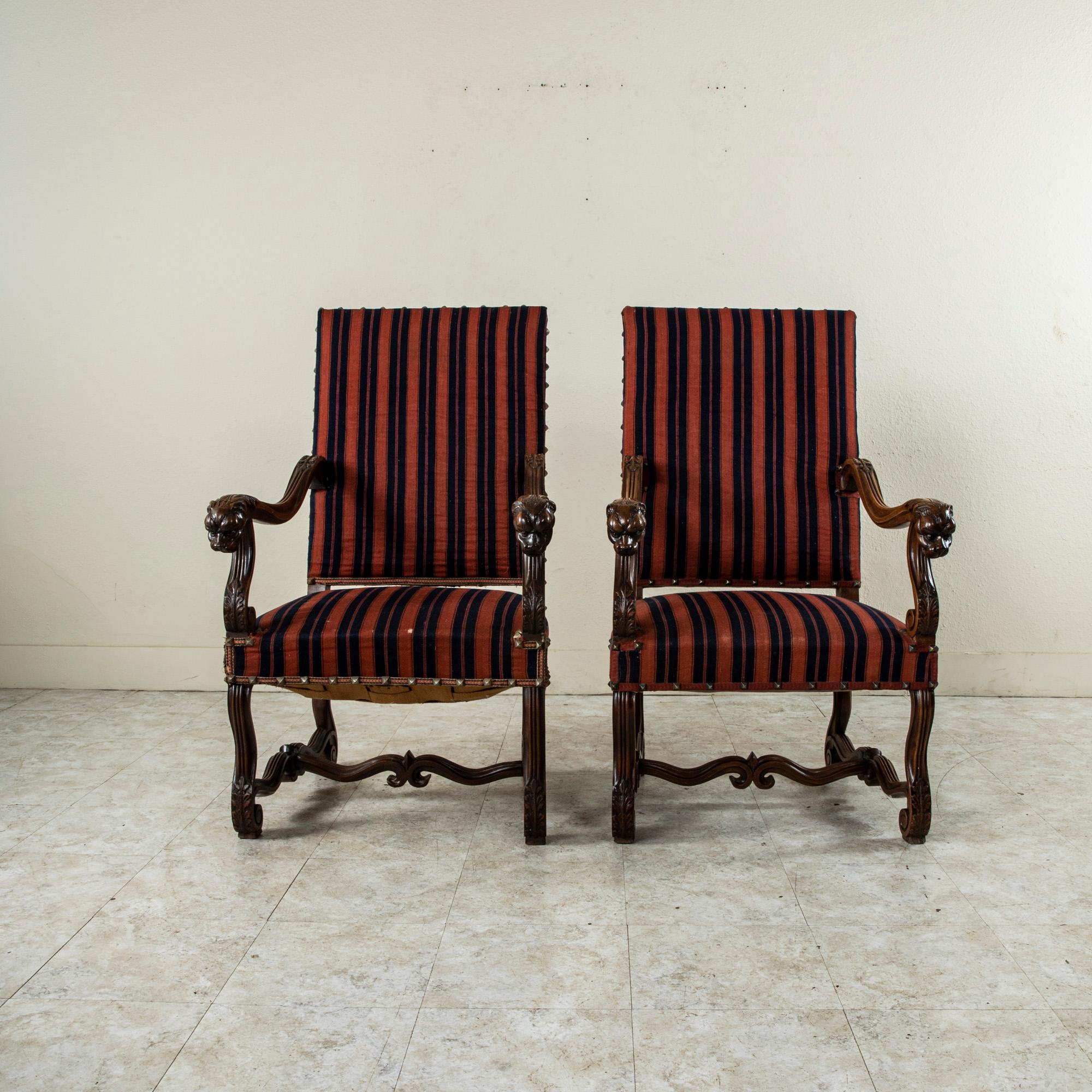 Hand-Carved 19th Century French Louis XIV Style Hand Carved Walnut Armchairs with Lion Heads For Sale