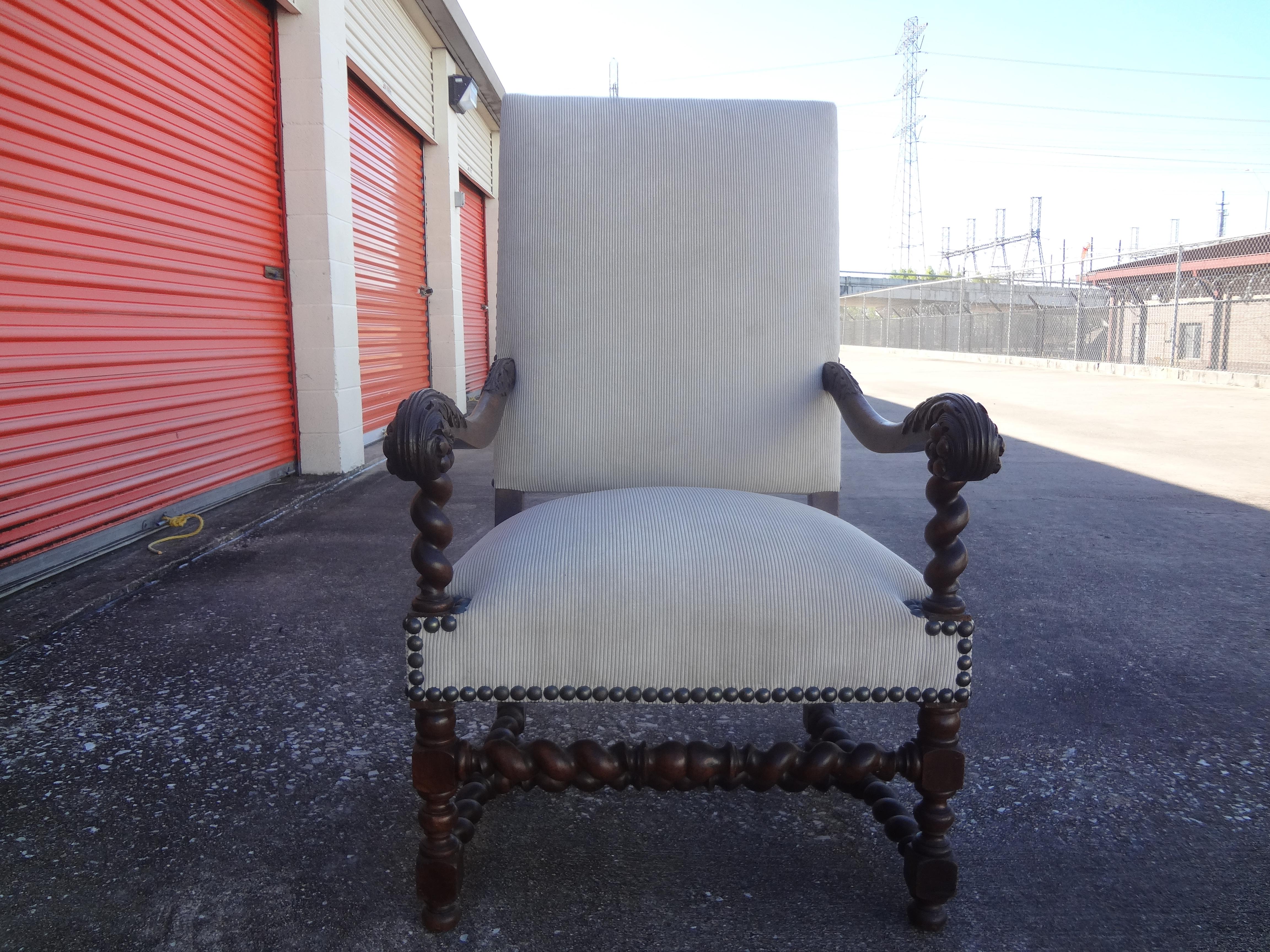 19th century French Louis XIV style walnut chair. This stunning antique French Louis XIV style armchair or side chair is both large and comfortable. We have newly upholstered this chair in a neutral cut velvet fabric with brass nail head detail to