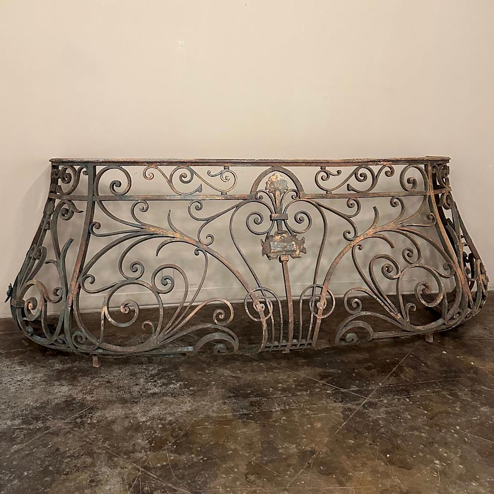 19th Century French Louis XIV Wrought Iron Bombe Balcony Railing is a stunning work of the metal sculptor's art!  Hand-forged during the heyday of the Napoleon III Period, it features a bold bombe form contouring out in two dimensions for amazing