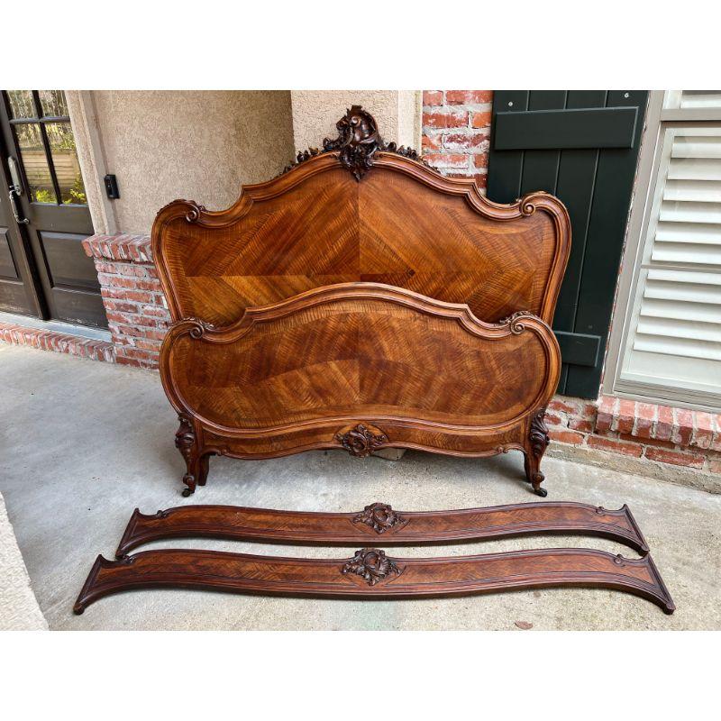 19th Century French Louis XV bed carved walnut Parisian Rococo by George Guerin.

Direct from France, a gorgeous antique French bed, with headboard, footboard and original rails!
With a glamorous serpentine form, the headboard features a large