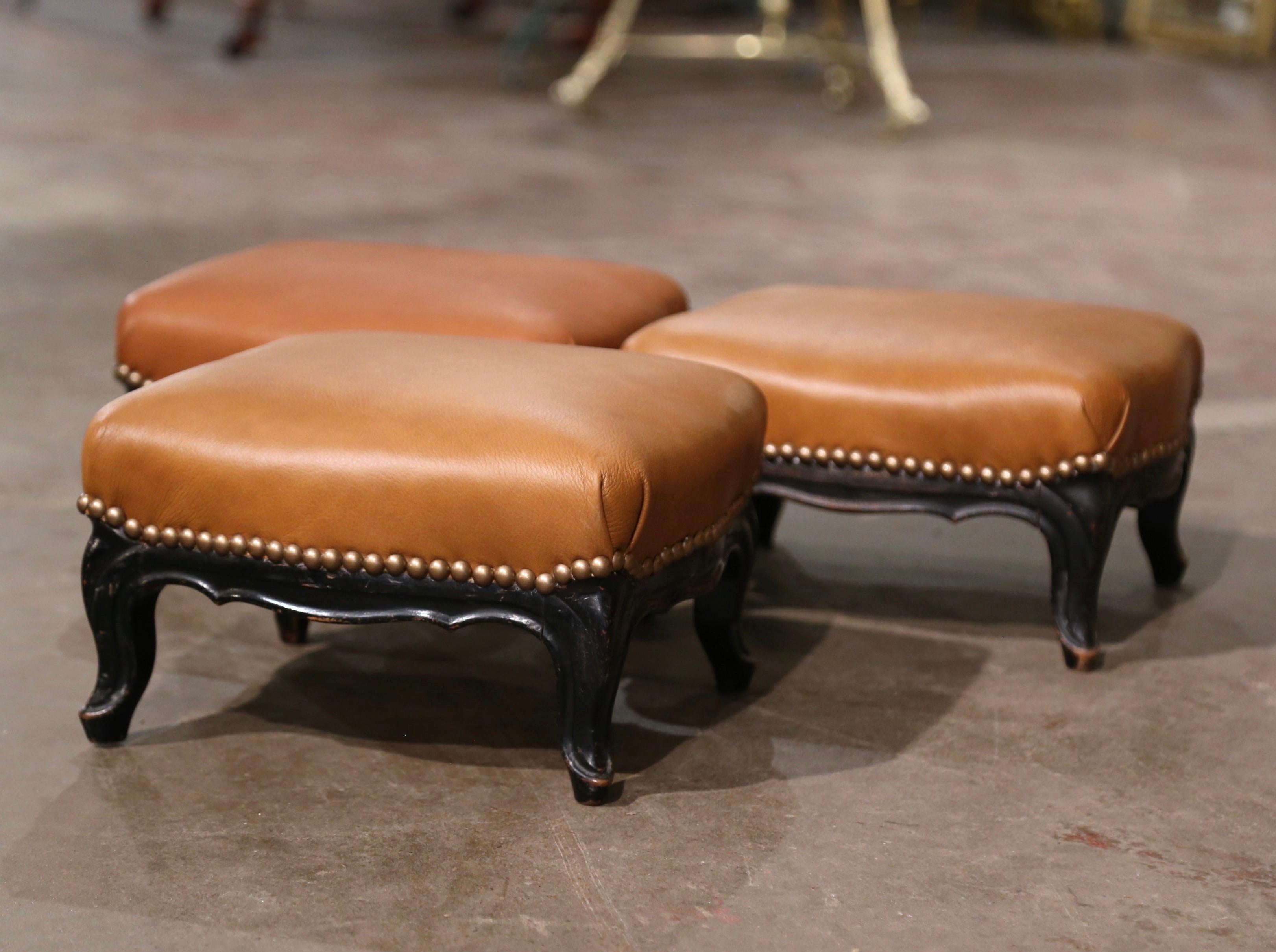 Hand-Carved 19th Century French Louis XV Carved Blackened Footstools with Leather, Set of 3  For Sale