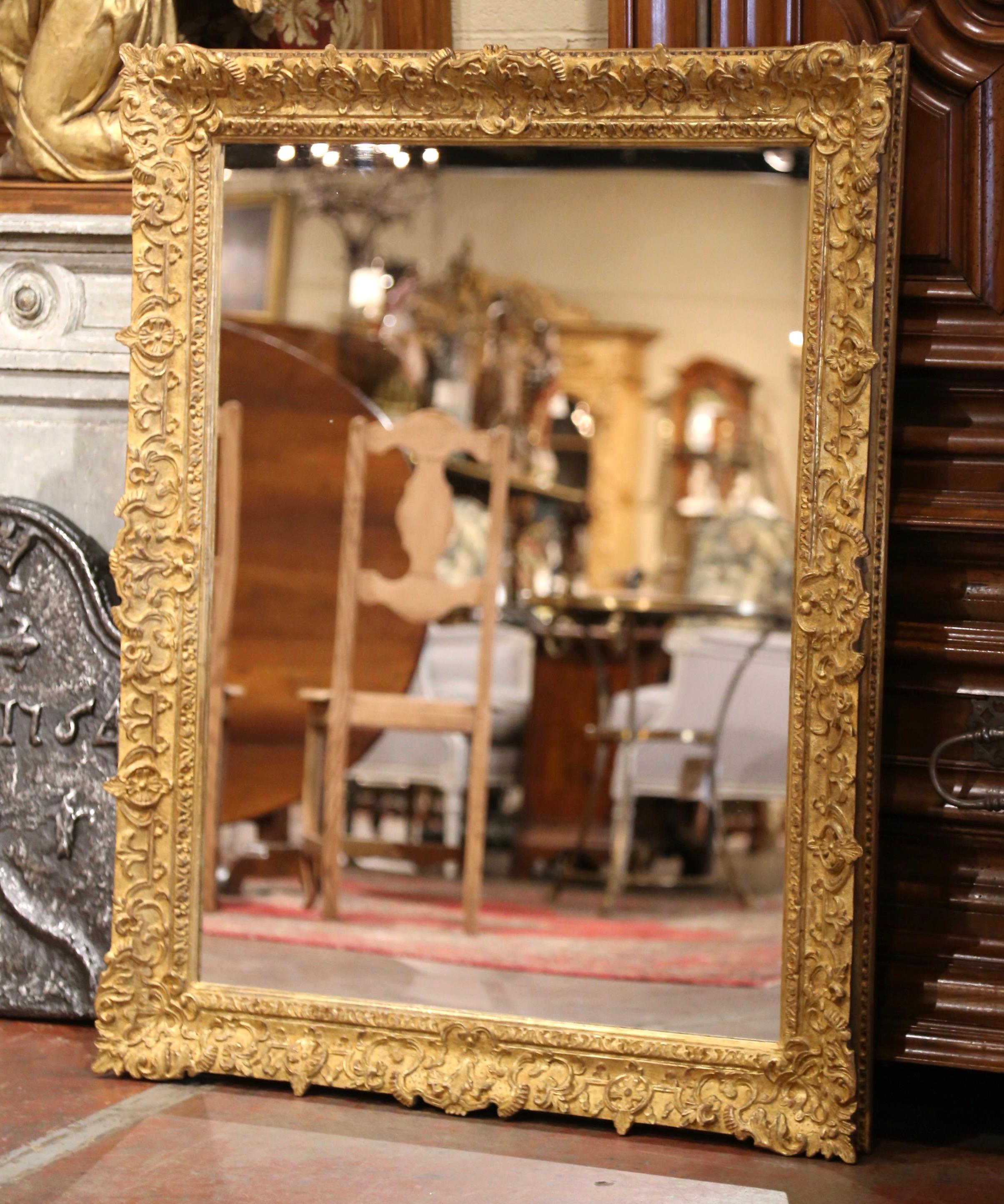 Hand-Carved 19th Century French Louis XV Carved Giltwood Mirror with Floral and Shell Decor