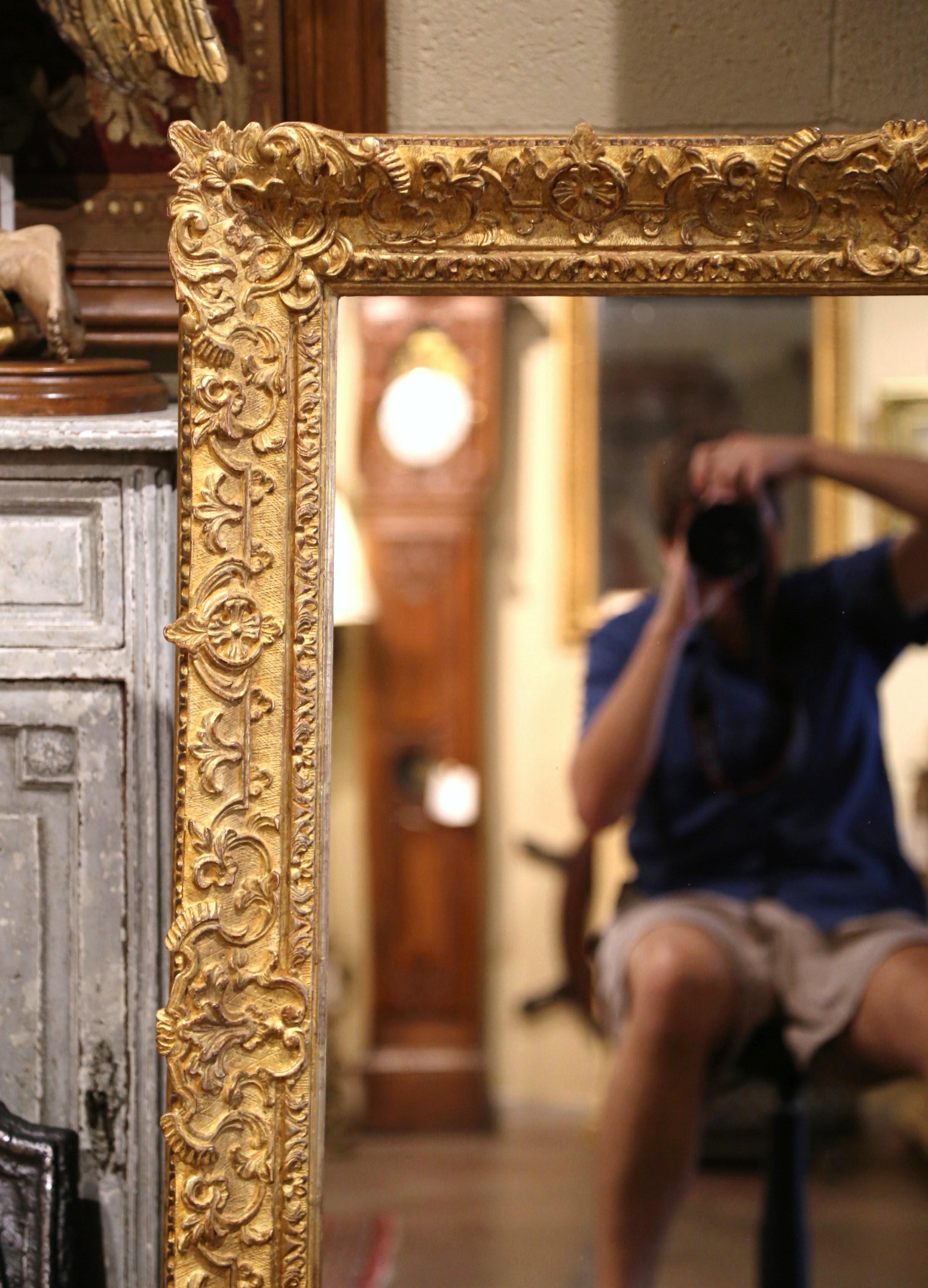19th Century French Louis XV Carved Giltwood Mirror with Floral and Shell Decor In Excellent Condition In Dallas, TX