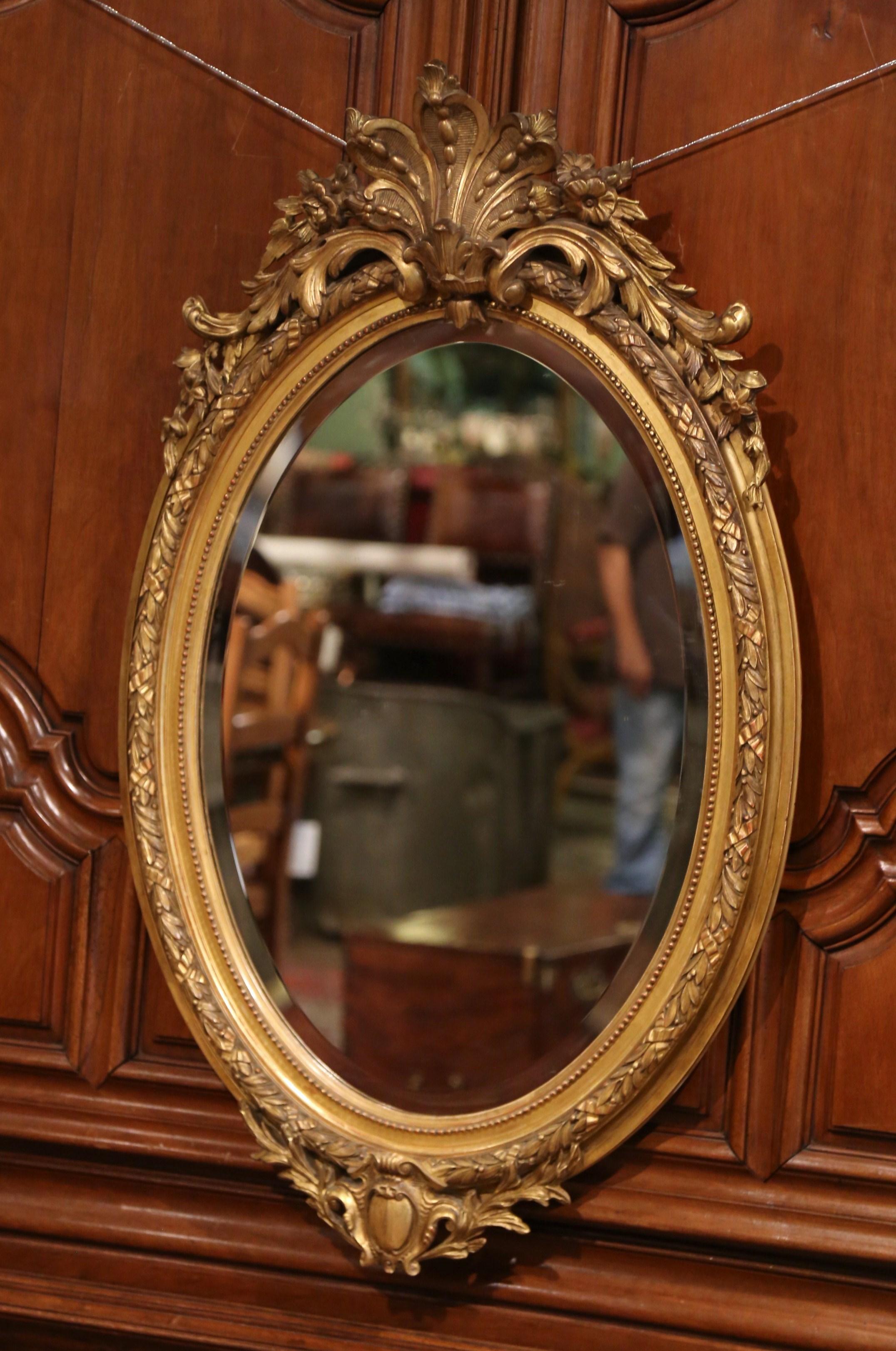 19th Century French Louis XV Carved Giltwood Oval Mirror with Shell Cartouche 1