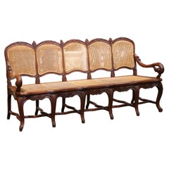 19th Century French Louis XV Carved Oak Five-Seat Caned Settee