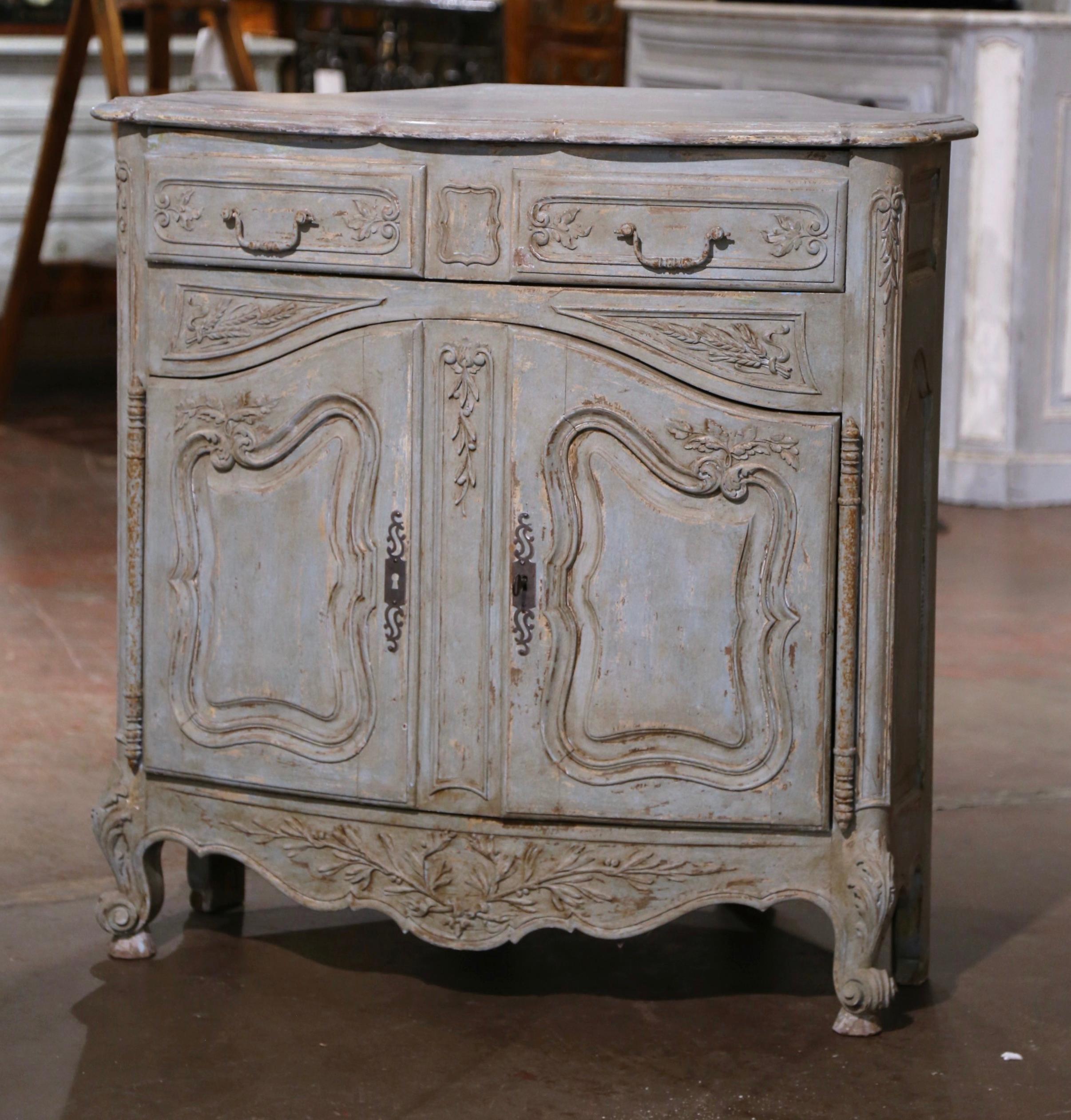 This elegant, antique corner cabinet was carved in Southern France, circa 1880. The classic 