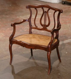 19th Century French Louis XV Carved Walnut and Cane Child Armchair
