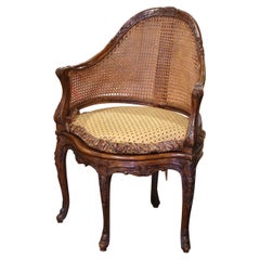 19th Century French Louis XV Carved Walnut and Cane Desk Armchair with Cushion