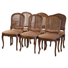 19th Century French Louis XV Carved Walnut and Cane Dining Chairs, Set of Six
