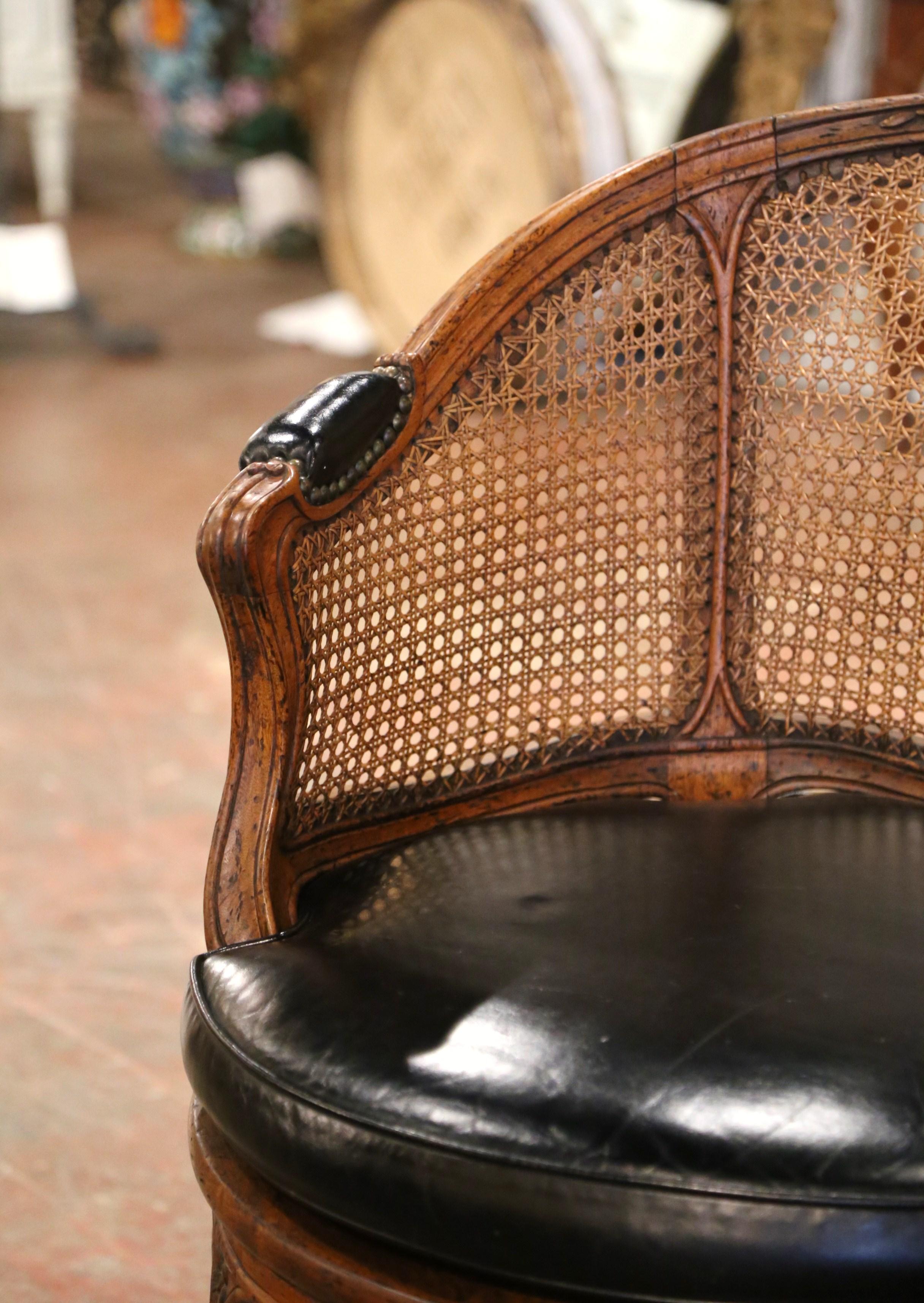 19th Century French Louis XV Carved Walnut, Cane & Leather Swivel Desk Armchair  In Excellent Condition In Dallas, TX
