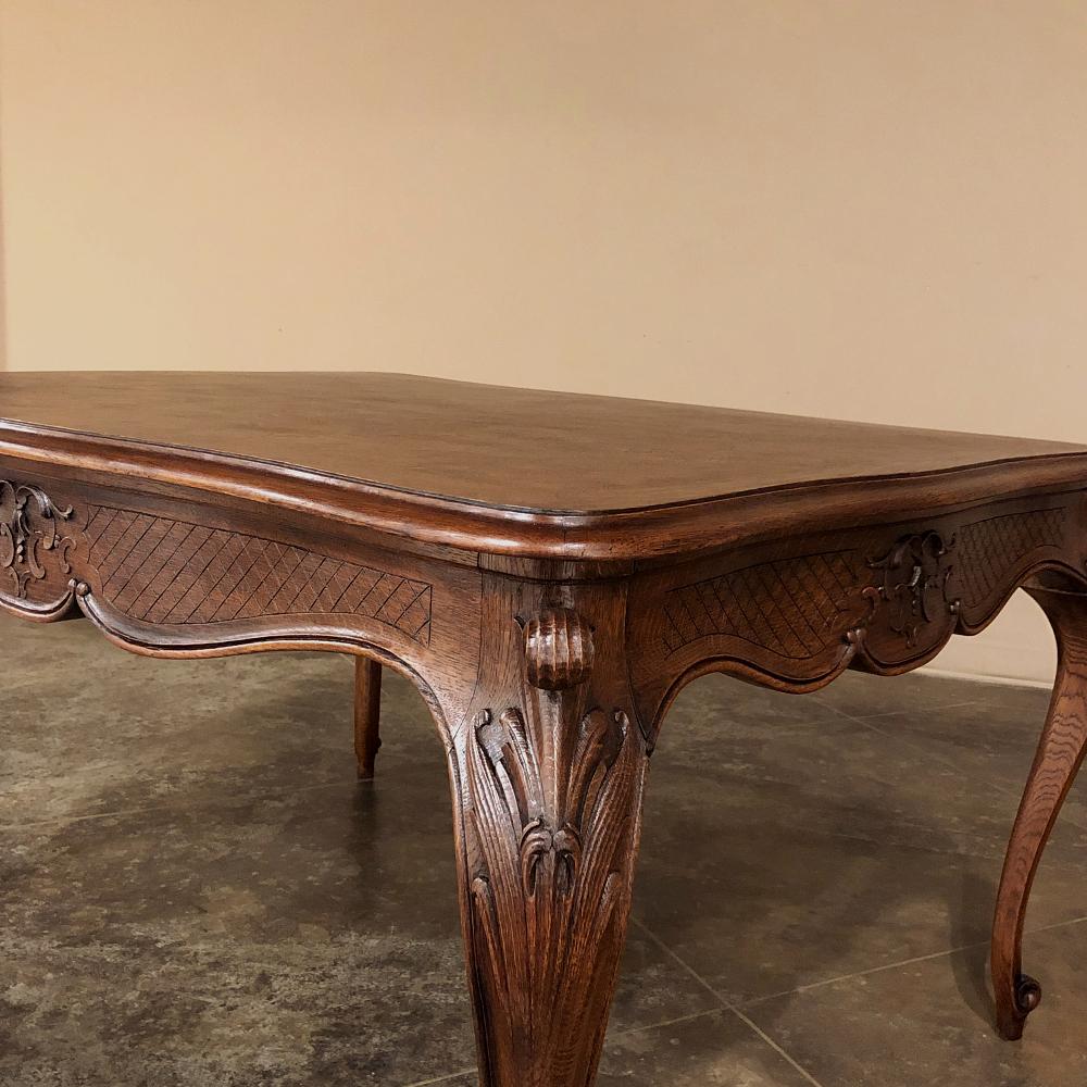 19th century French Louis XV desk ~ Dining table is an exceptionally versatile piece, perfect for the stylish executive or doubles as a dining table for the efficient floor plan! Hand-crafted from solid oak, it features a parquet top with contoured