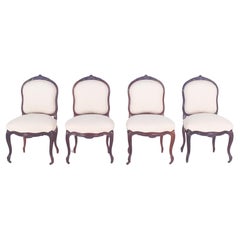 Quatre chaises en bois de rose Louis XV du 19e siècle