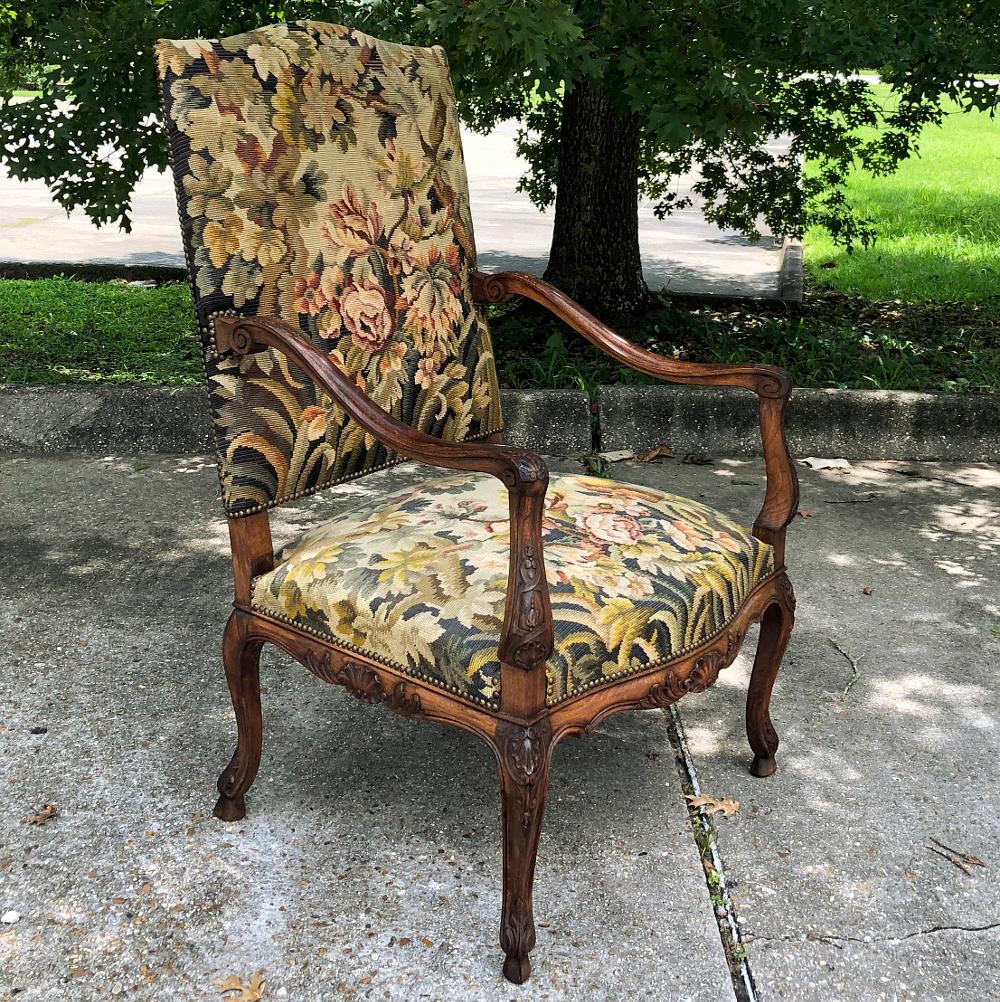 19th Century French Louis XV fruitwood armchair ~ Fauteuil with Needlepoint Tapestry is a remarkable example of expert craftsmanship melded with extraordinary artistry! Utilizing selected fruitwood, the craftsmen sculpted naturalistic and sinuous