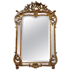 Miroir en bois doré Louis XV du XIXe siècle