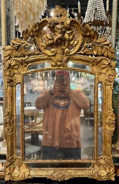 Miroir en bois doré Louis XV du XIXe siècle