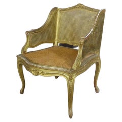 Used 19th Century French Louis XV Golden Wood and Caned Armchair