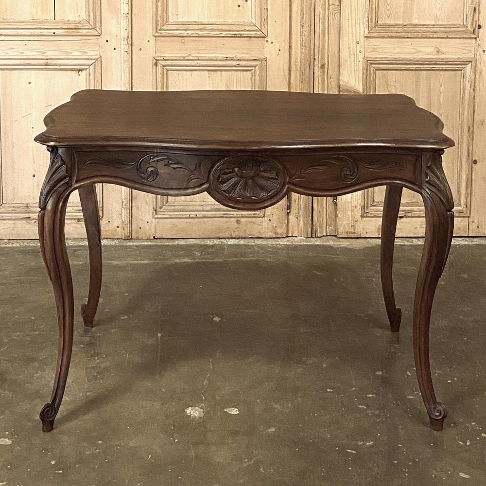 19th century French Louis XV hand carved walnut end table is part of a fast-disappearing genre of fine antique furnishings from the continent that are getting harder to find with each passing day! Handcrafted from fine French walnut, large posts