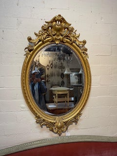 19th Century French Louis XV Oval Giltwood Mirror