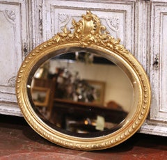 19th Century French Louis XV Oval Giltwood Wall Beveled Mirror with Crest