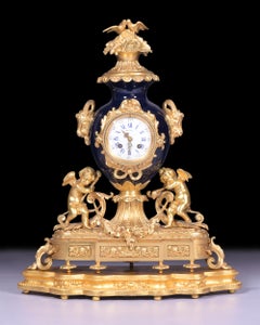 Reloj de manto de ormolu y porcelana francés del siglo XIX estilo Luis XV Rococo