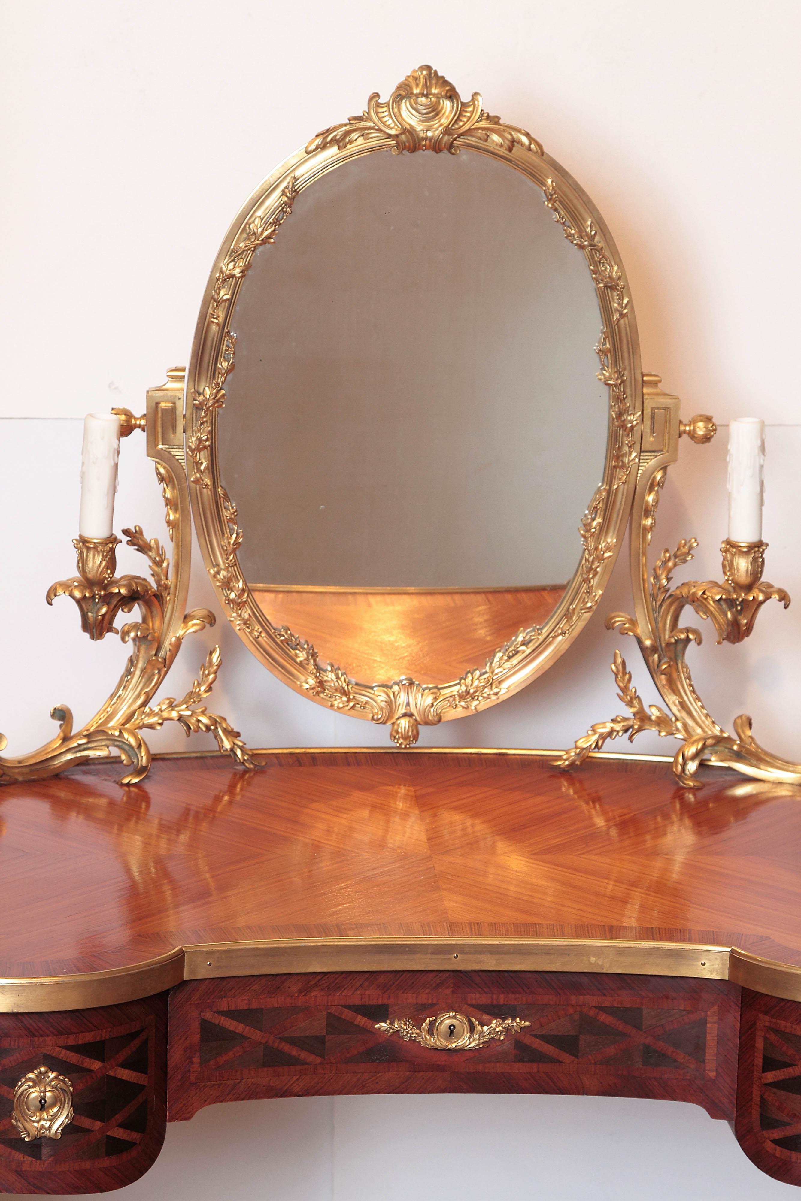 Very fine French Louis XVI mahogany with parquetry inlayed dressing table. Signed Charles Bernel Paris in the lock plate. Bernel had a retail showroom in Paris in the mid-late 19th century. He retailed pieces from cabinetmakers in Paris to his