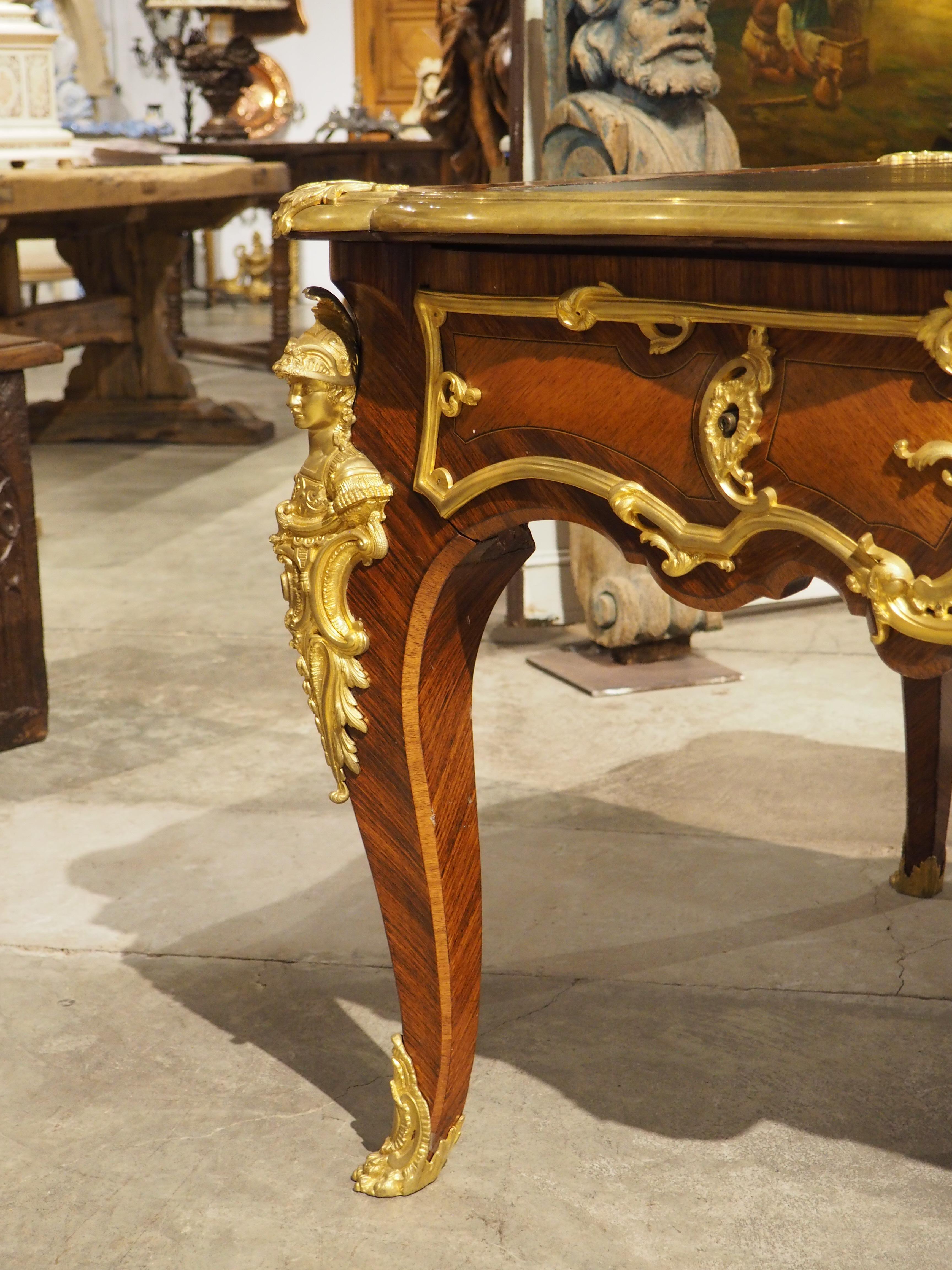 Hand-Carved 19th Century French Louis XV Style Bureau Plat “à Têtes De Guerriers Antiques” For Sale