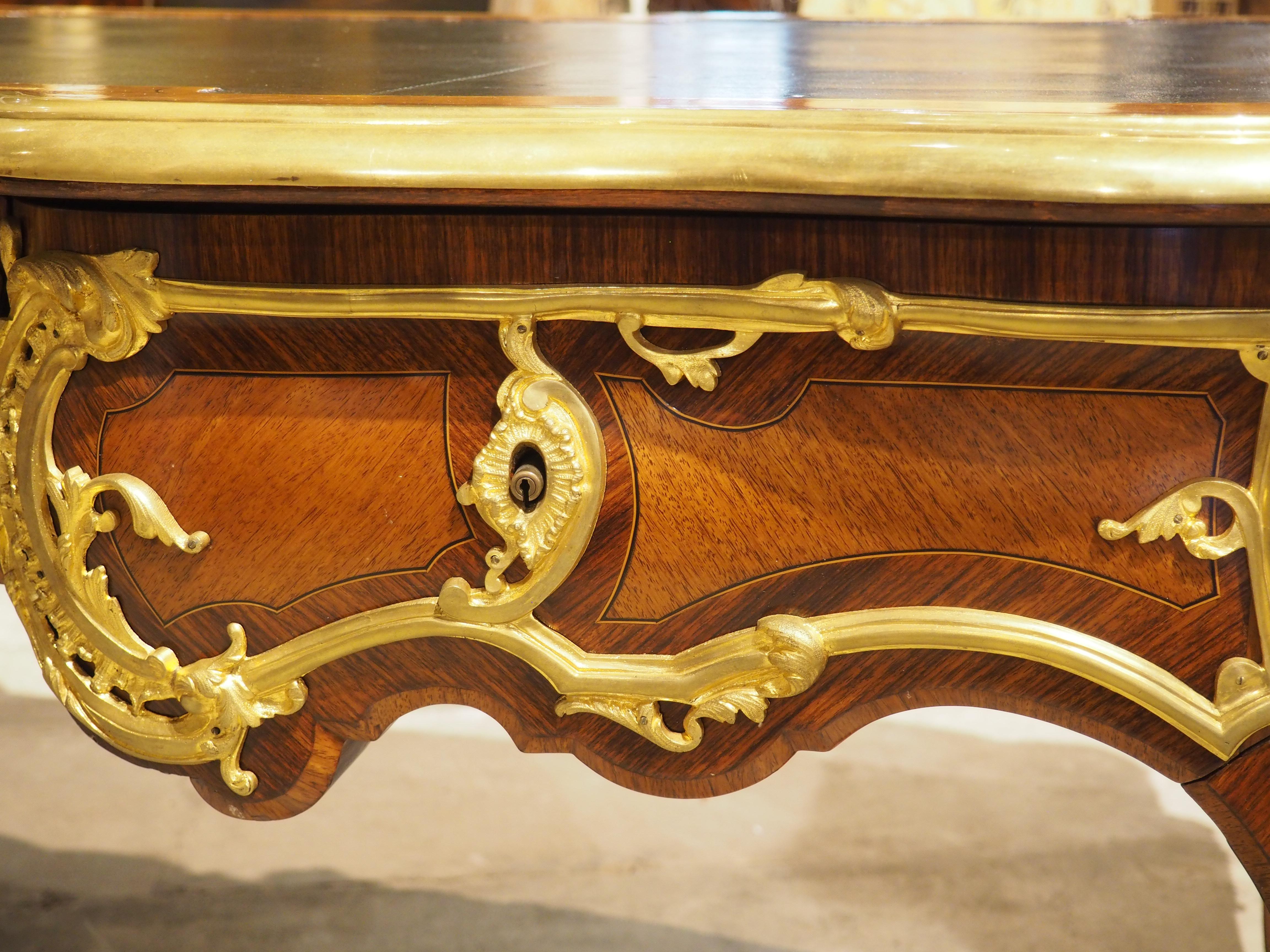 Metal 19th Century French Louis XV Style Bureau Plat “à Têtes De Guerriers Antiques” For Sale