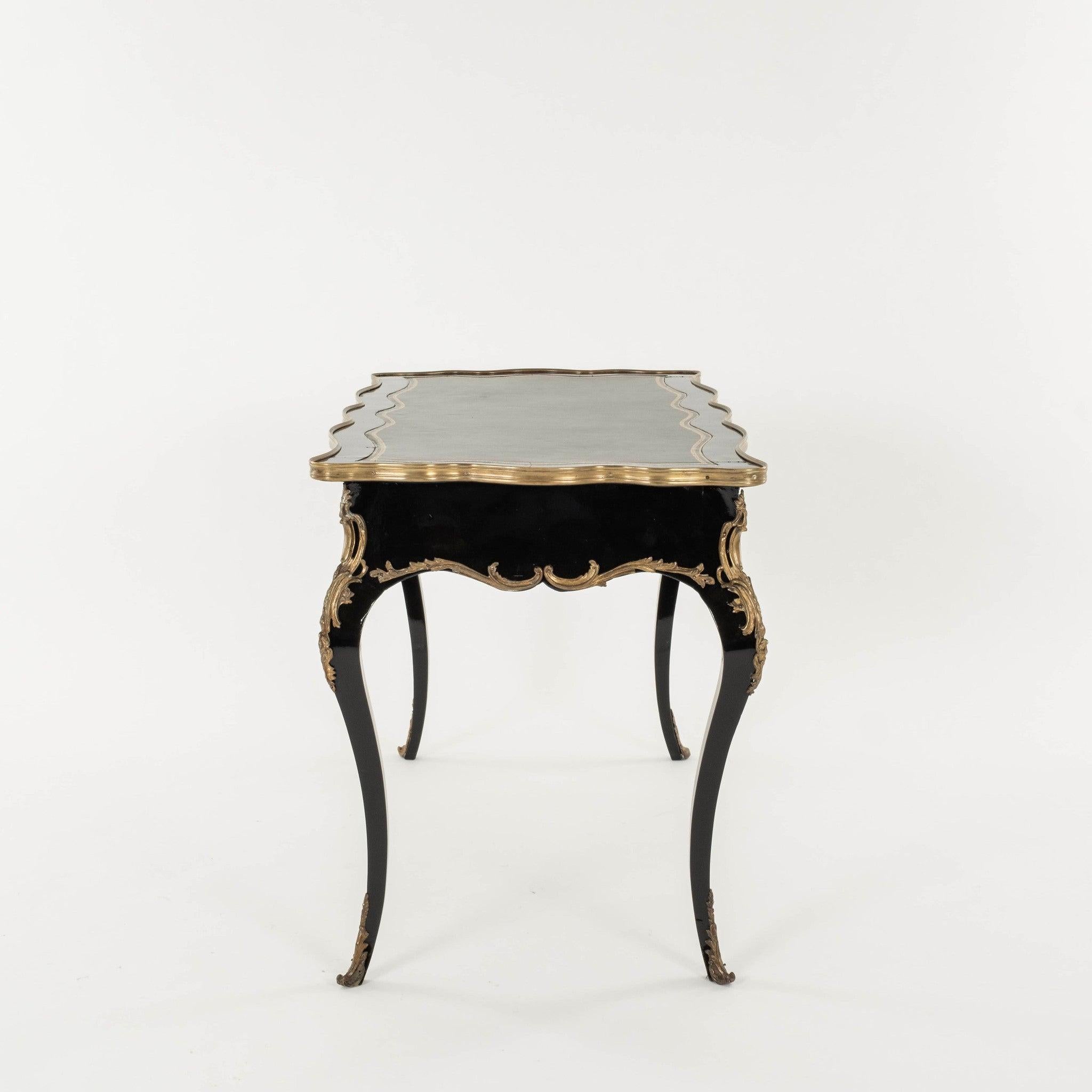 19th Century French bureau plat featuring a high-gloss black
