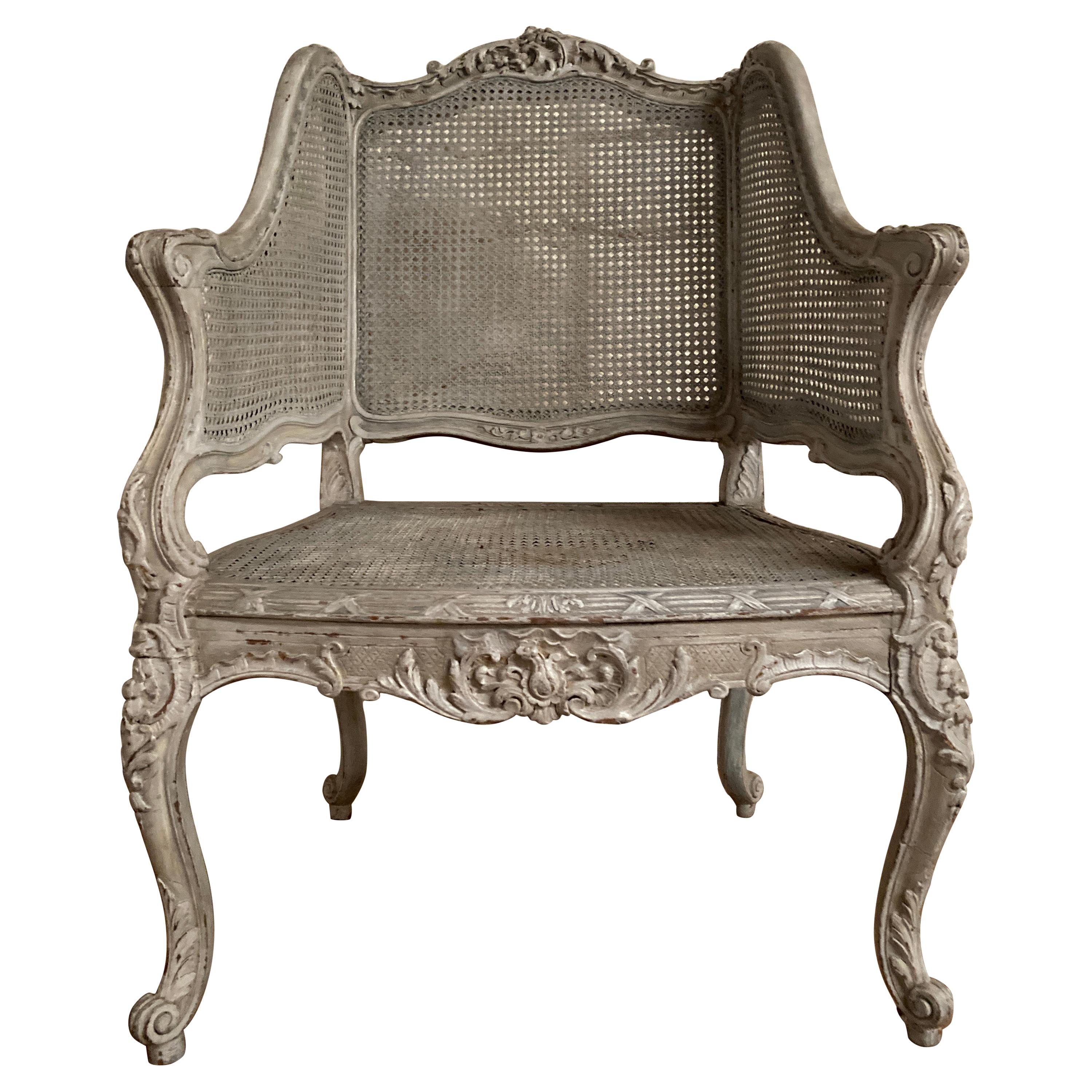 19th Century French Louis XV Style Caned Bergere with a Painted Finish