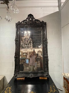 19th Century French Louis XV Style Carved and Black Lacquered Mirror