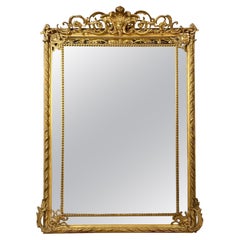 Miroir à coussin en bois sculpté et doré, style Louis XV, 19e siècle