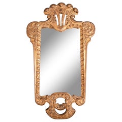 Miroir en bois doré sculpté de style Louis XV du 19ème siècle français