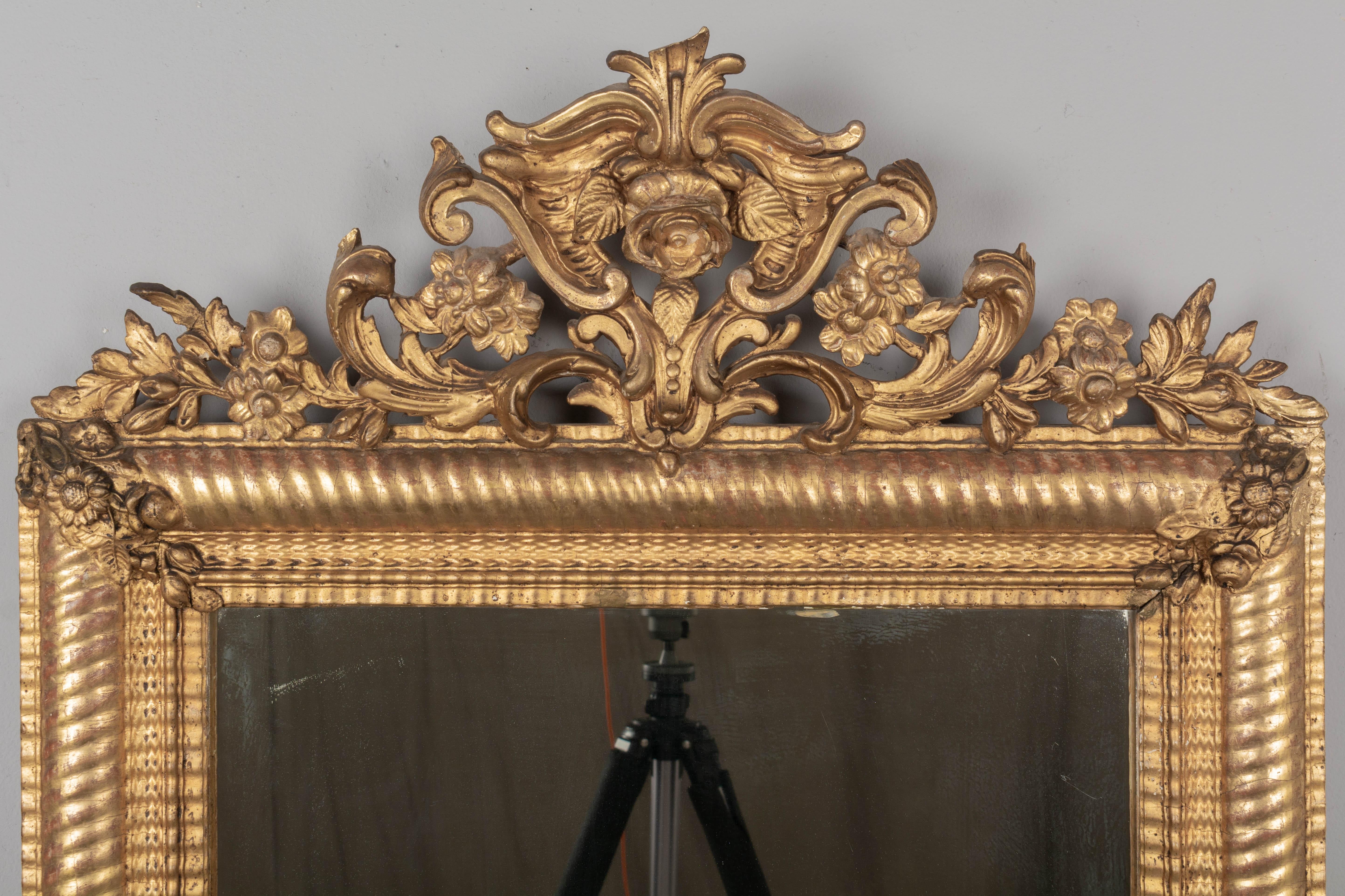 Hand-Crafted 19th Century French Louis XV Style Gilded Mirror For Sale