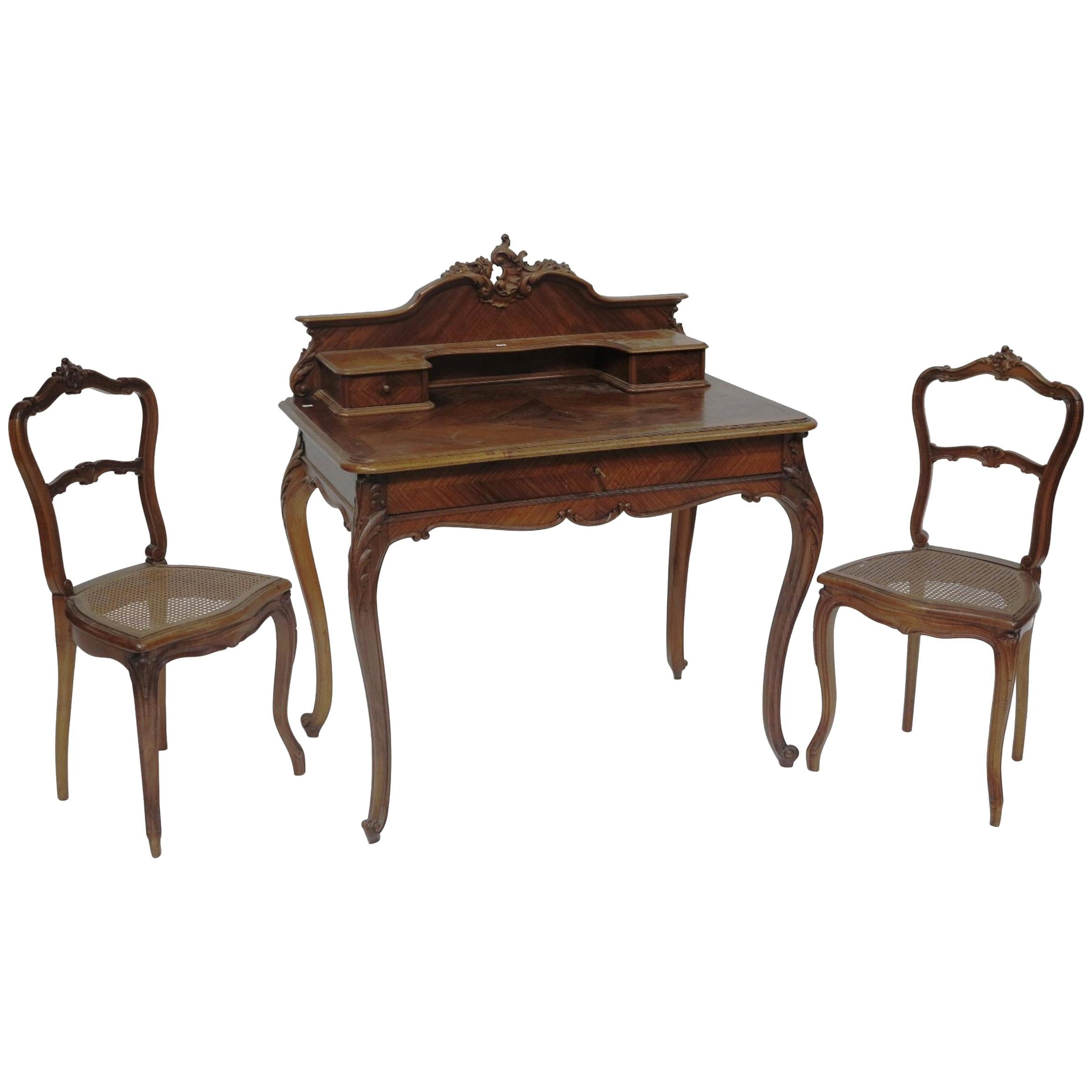 19th Century French Louis XV Style Hand Carved Writing Desk and Two Cane Chairs