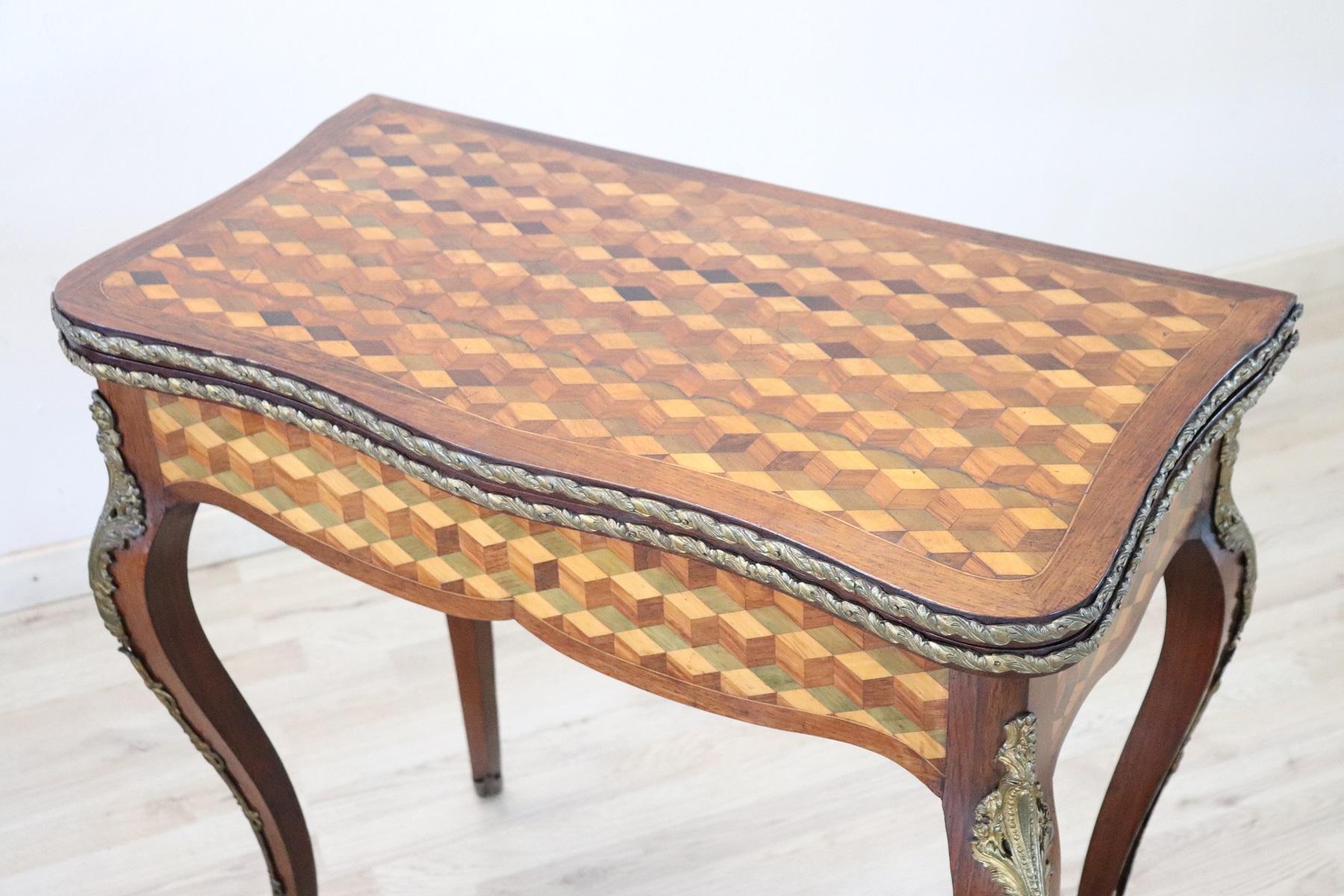 Rare and fine quality French Louis XV style 1880s game table in inlay marquetry rosewood, the legs are long and slender. The decoration is on each side so you can place the tables also in the centre of the room. Made with precious woods of rosewood,