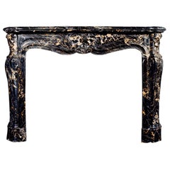 19th Century French Louis XV Style Portoro Marble Fireplace