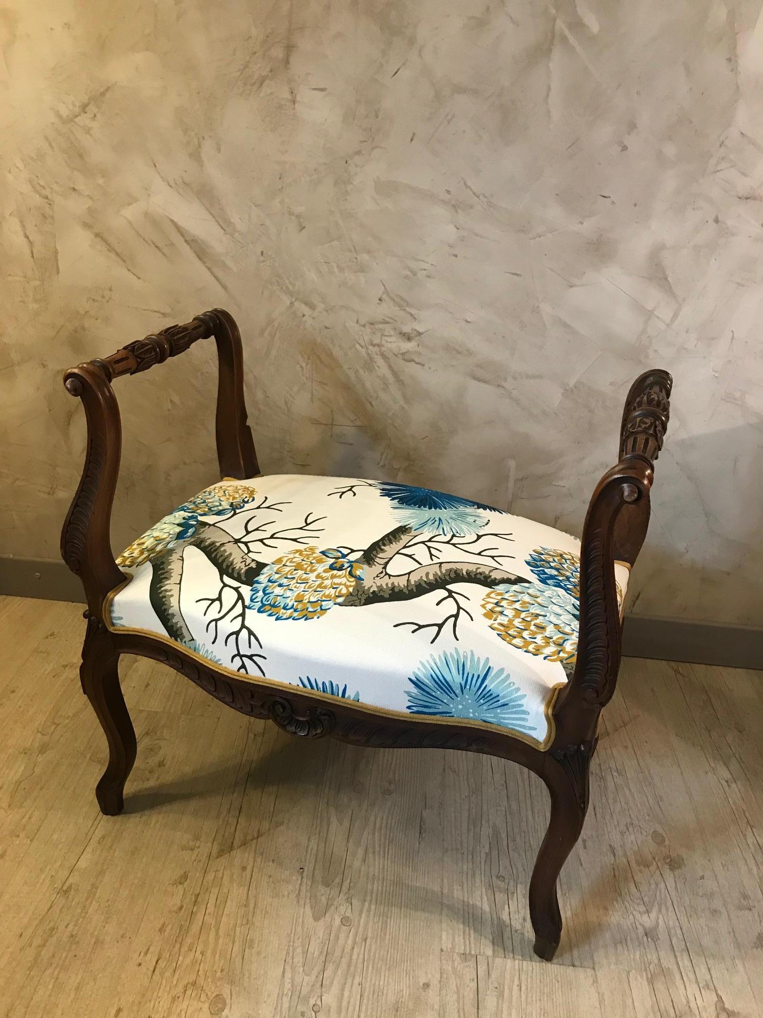 Very nice 19th century French Louis XV style walnut reupholstered footstool from the 1890s. 
This footstool has been upholstered with a beautiful French fabric from the Nobilis House, famous fabric house. 
Yellow braid finish. Very nice quality