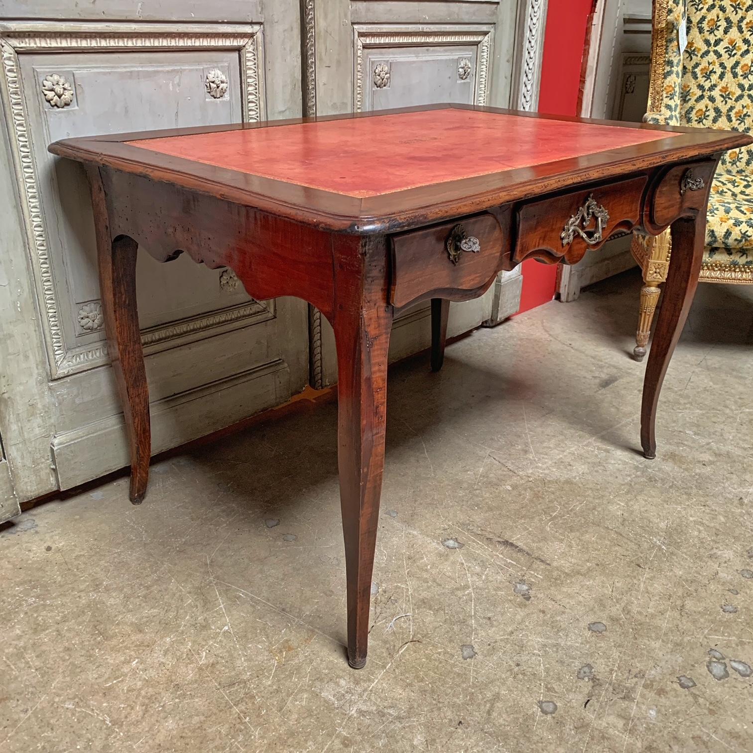 Carved 19th Century French Louis XV Style Walnut Writing Table with Red Leather Top For Sale